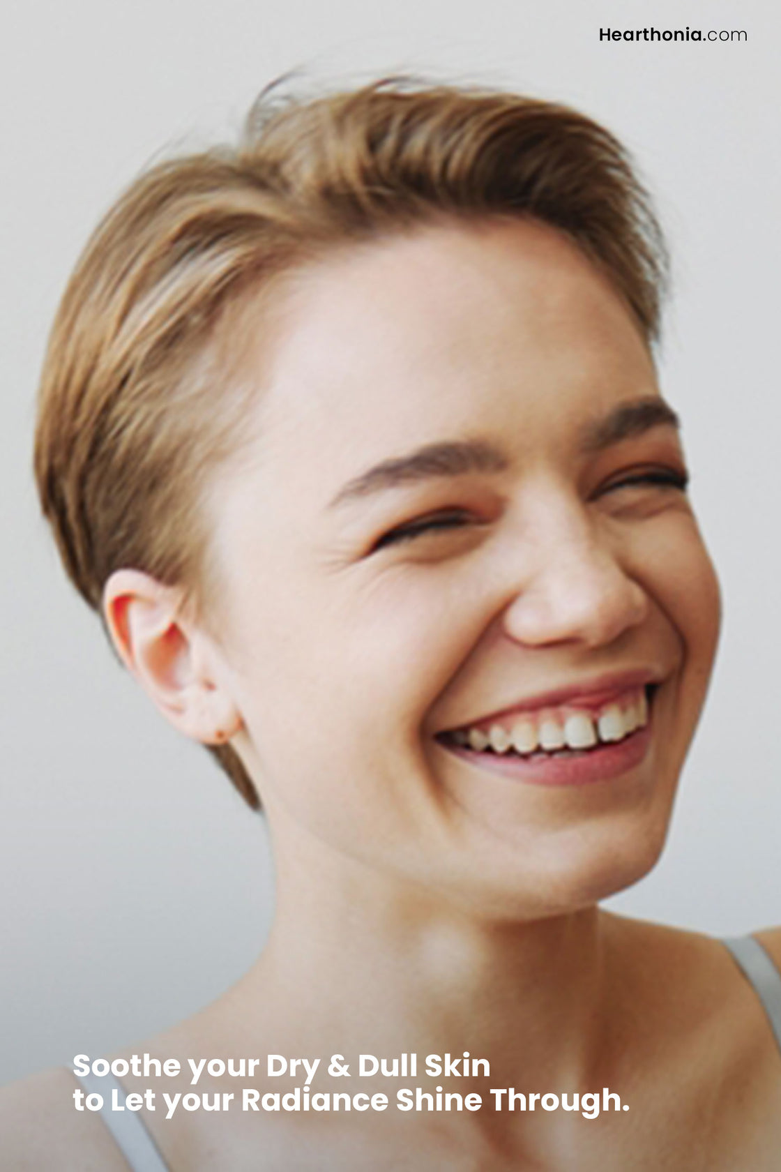 Smiling young woman showcasing how Druide Biolove Organic Witch Hazel Toner let's her radiance shine through.