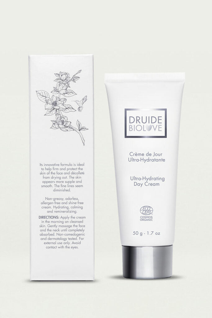 Druide Biolove Organic Ultra-Hydrating Day Cream, 50 g, 1.7 oz. white dispensing tube with its packaging box, displaying  Ecocert certified cosmos organic logo, shown against a clear background.