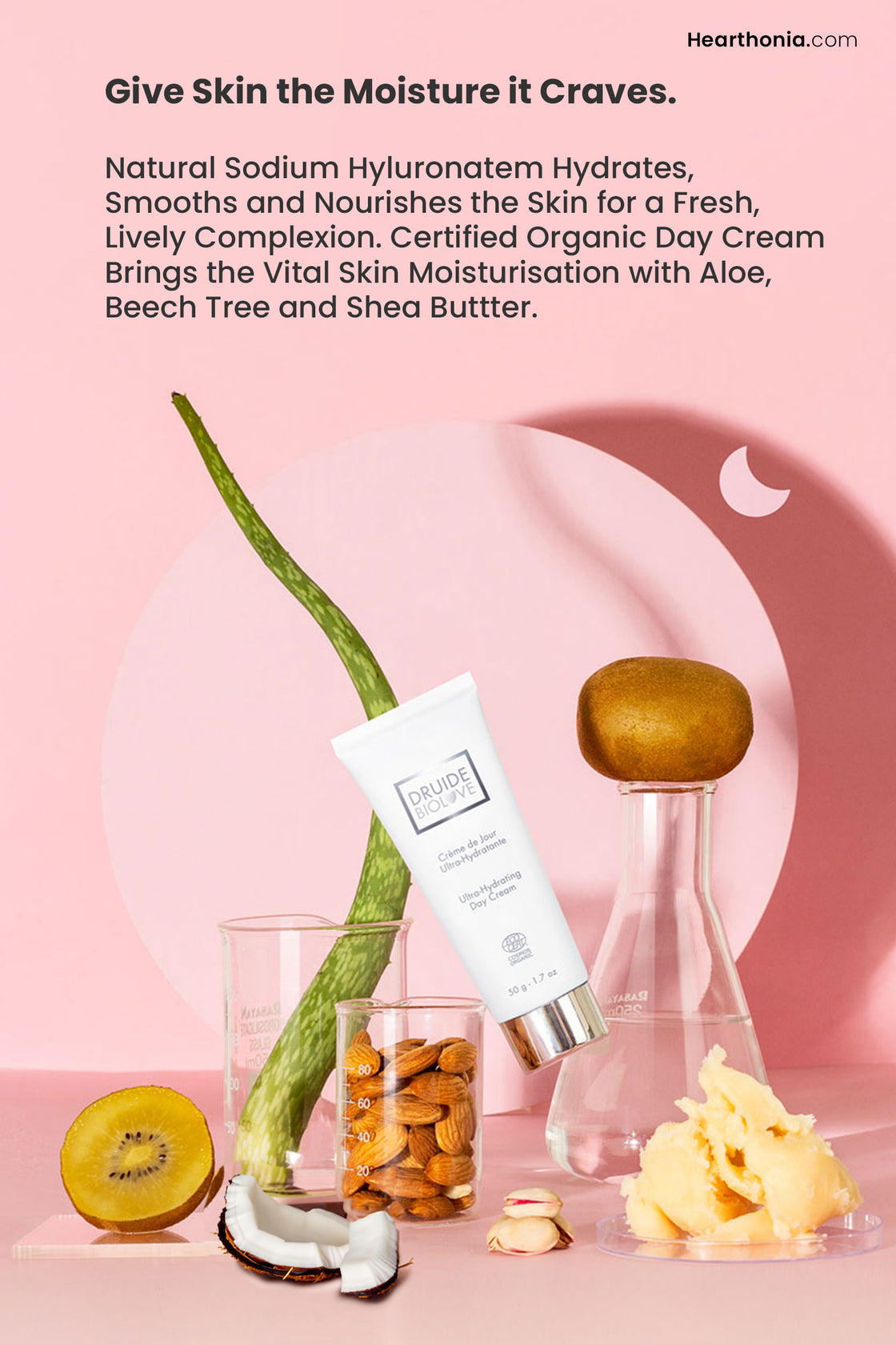 Druide Biolove Organic Ultra-Hydrating Day Cream white tube surrounded by fresh ingredients like aloe vera, shea butter, and coconut, with text headline reading "give skin the moisture it craves".