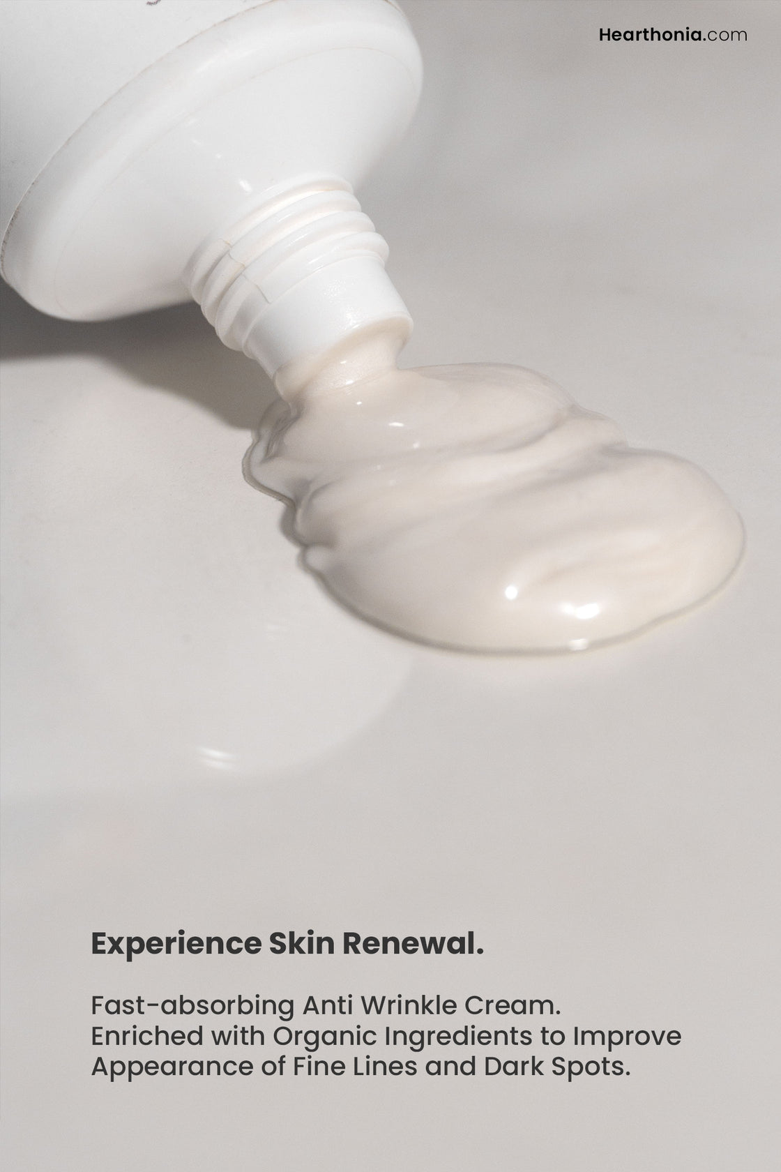 Druide Biolove Organic Nightly Ultra Nourishing Cream dispensing natural texture and slightly off white cream from its tube with text "experience skin renewal".