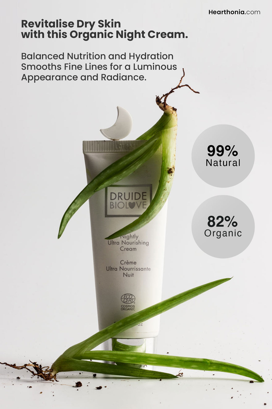 Druide Biolove Organic Nightly Ultra Nourishing Cream, in its white tube dispenser amid two aloe vera plant stems with roots showing, highlighting its 99% natural and 82% organic certification with text "revitalise dry skin with this organic night cream".