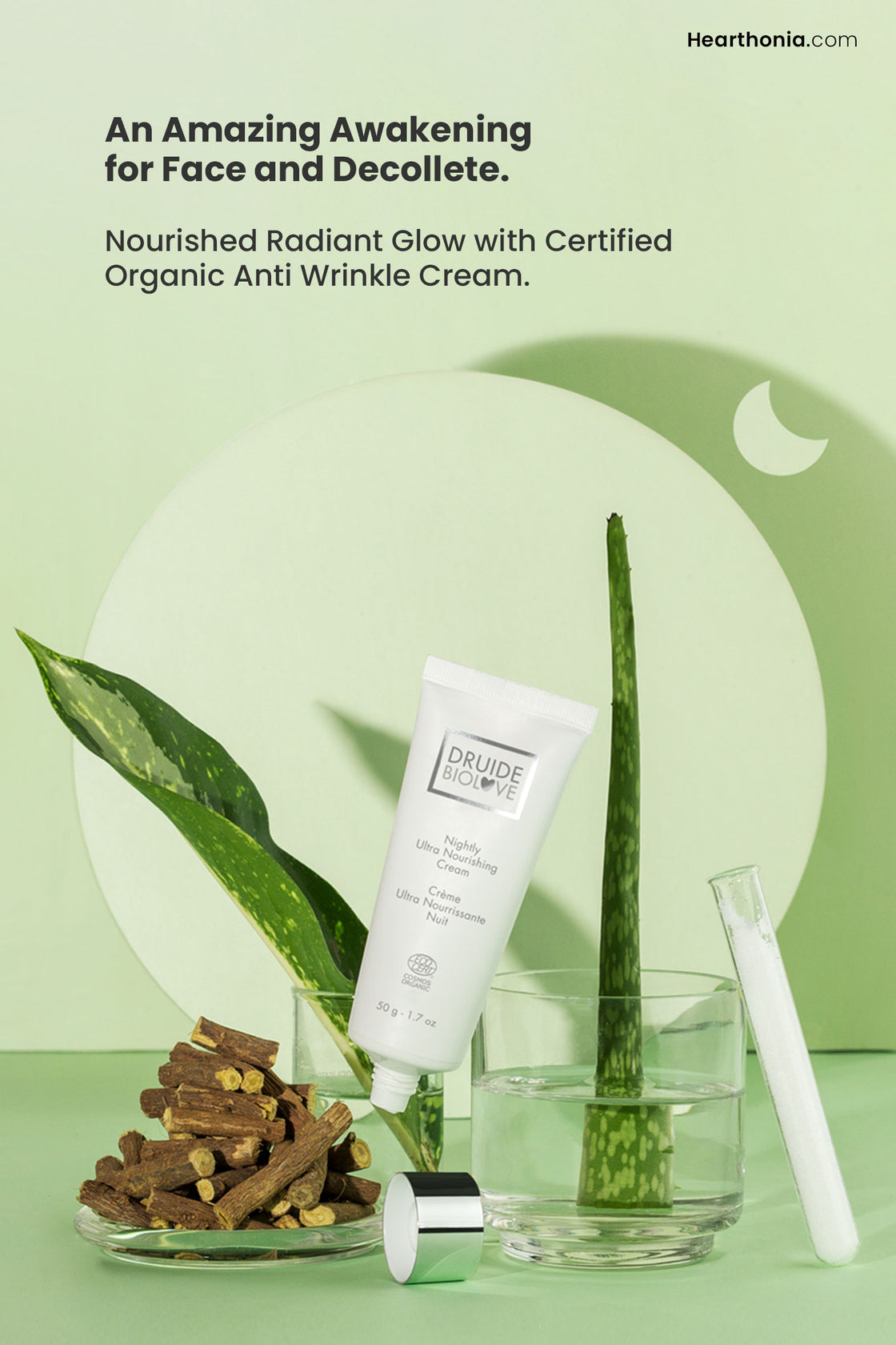 Druide Biolove Organic Nightly Ultra Nourishing Cream in its white tube surrounded by natural ingredients like aloe vera, and plant roots with text "an amazing awakening for face and decollete".