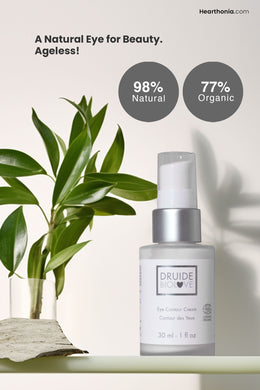 Druide Biolove Organic Eye Contour Cream placed on a shelf amidst green plants and text reading 
