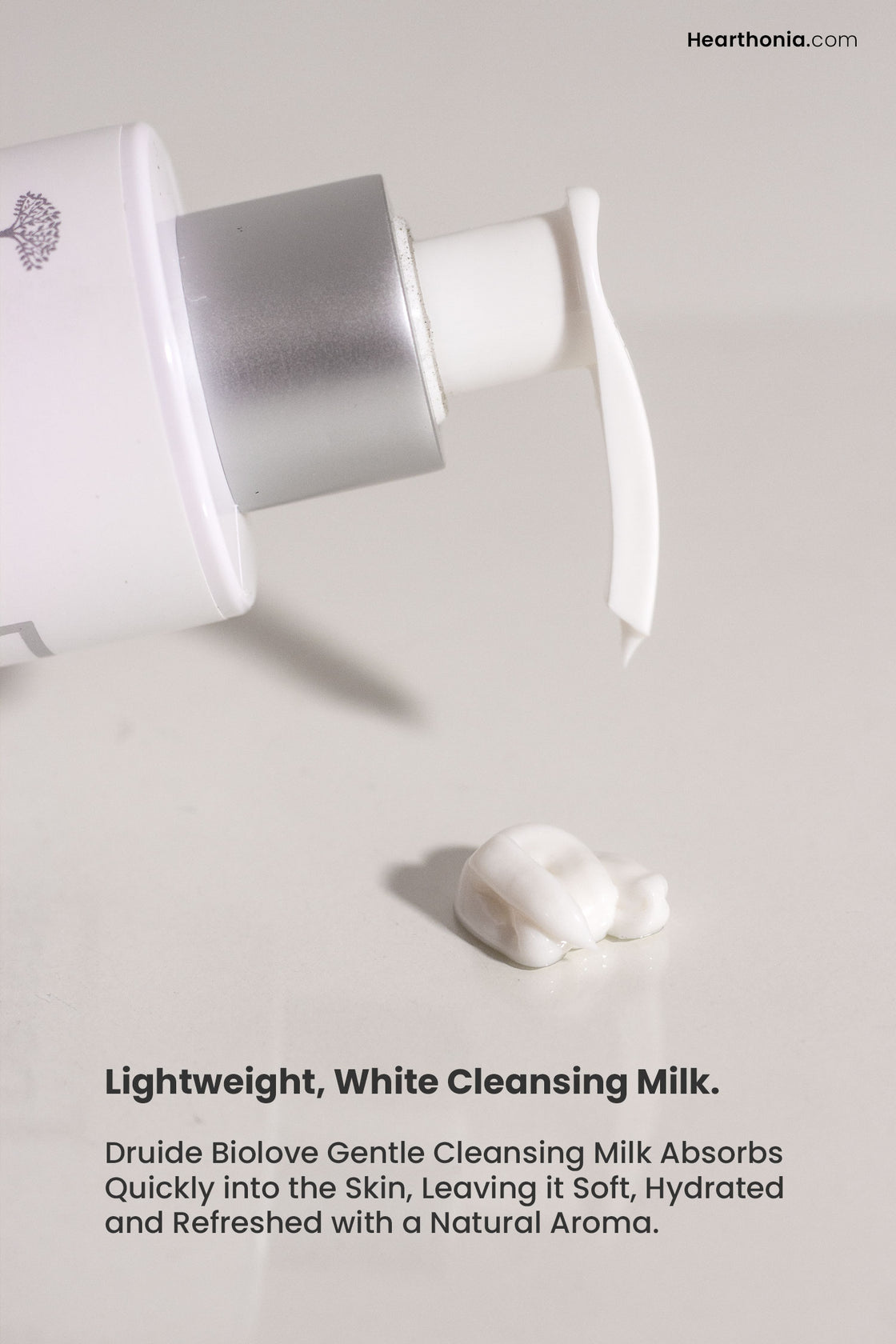 Druide Biolove Organic Gentle Cleansing Milk dispensing white creamy texture cleanser on clean surface.