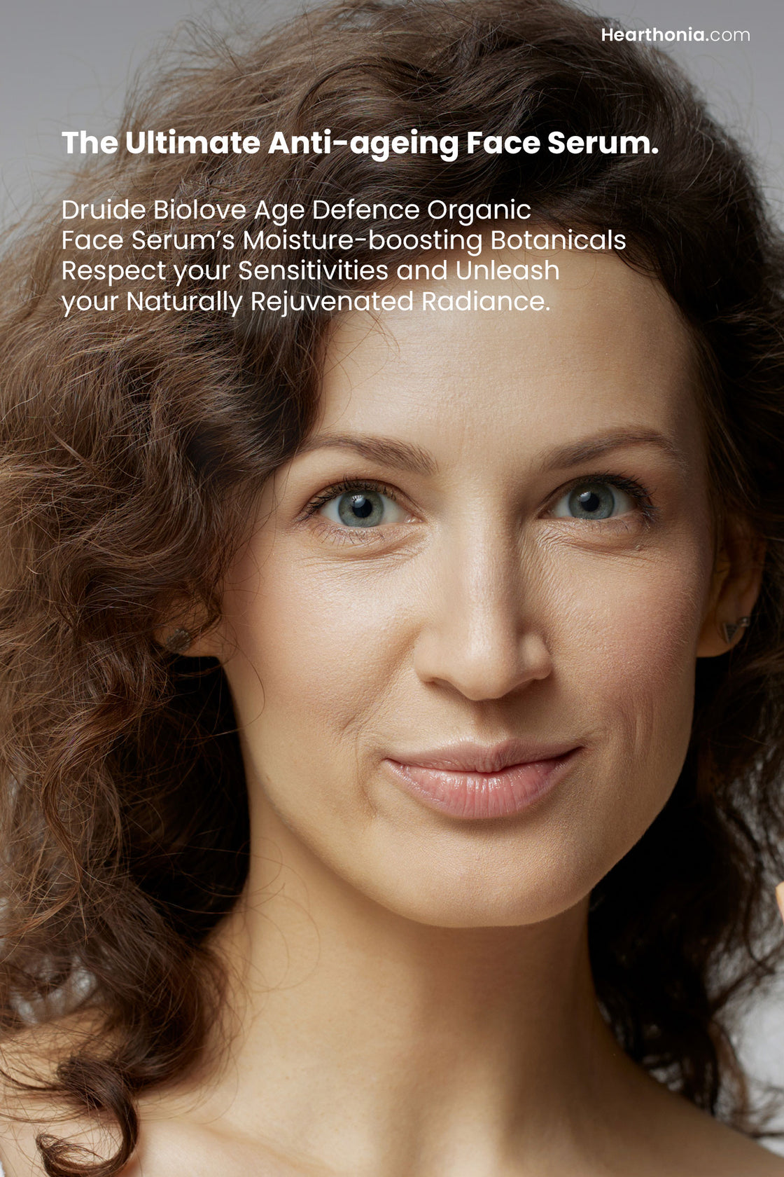 Face image of a smiling and content  woman showcasing her healthy skin. Text overlay states "ultimate anti ageing face serum".