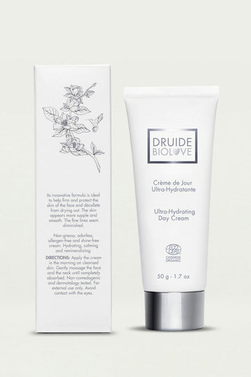 Druide Biolove Organic Ultra-Hydrating Day Cream, 50 g, 1.7 oz. white dispensing tube with its packaging box, displaying  Ecocert certified cosmos organic logo, shown against a clear background.