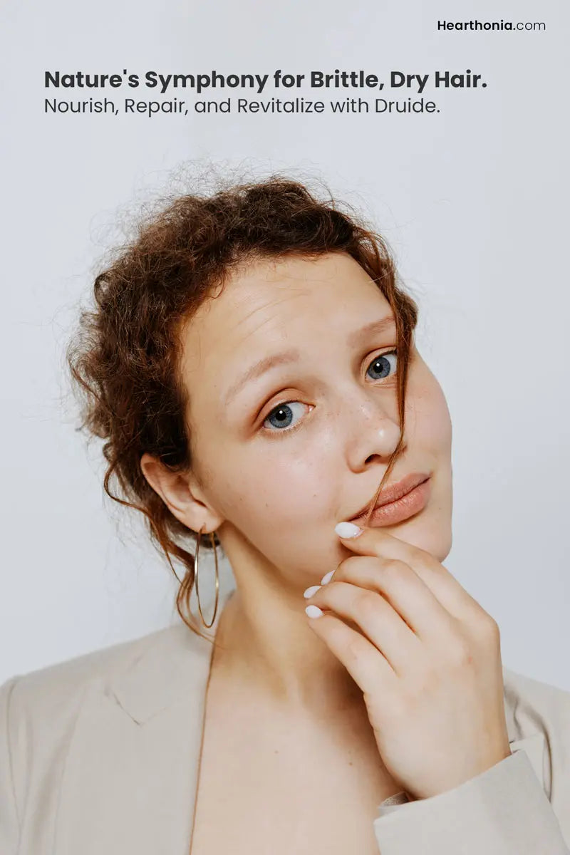 happy woman with curly brown hair looking at herself, with text reading "nature's symphony for brittle dry hair".