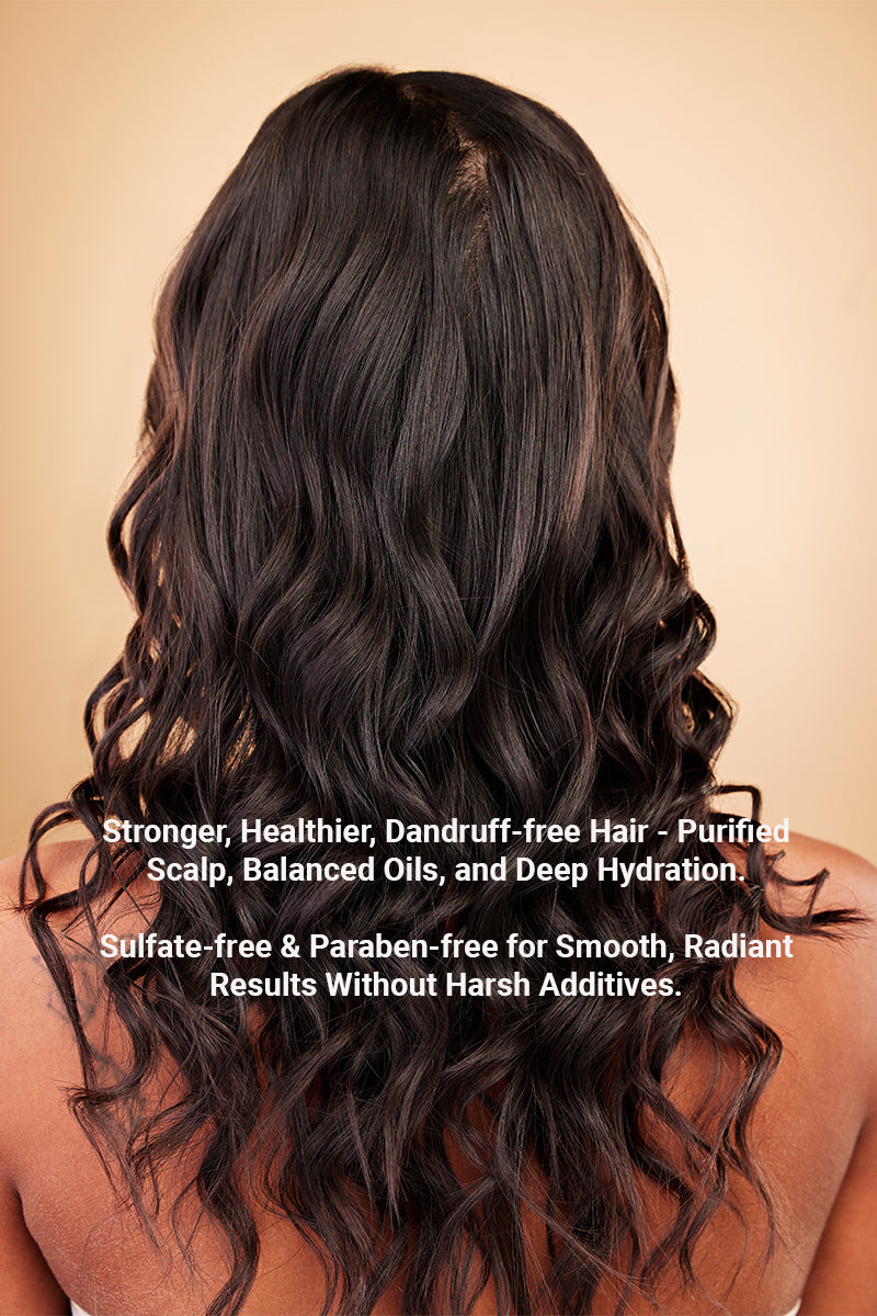 woman's long light curled tresses shown with text reading "stronger healthier dandruff free hair, purified scalp, balanced oils, and deep hydration".
