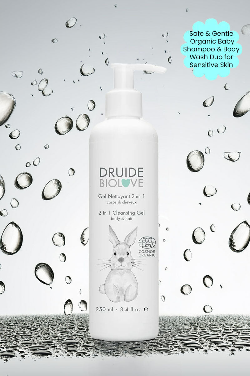 Druide Biolove Organic Baby Body wash and Shampoo dispenser against background of water beads with text "safe and gentle organic baby shampoo and body wash duo for sensitive skin".