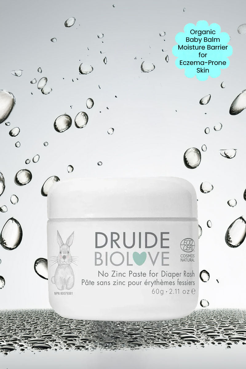 Druide Biolove organic baby balm tub against background if water beads with text "organic baby balm moisture barrier for eczema prone skin".