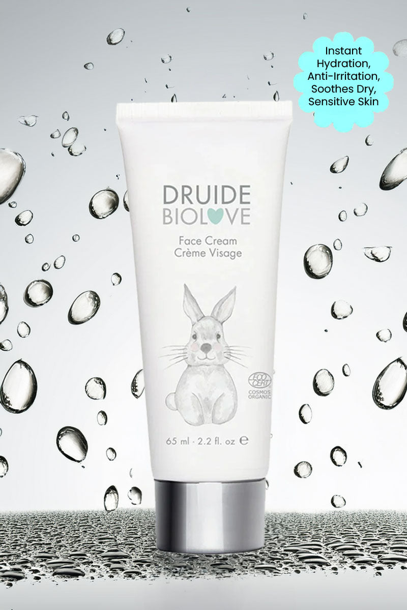 Druide Biolove organic baby face cream against background if water beads with text "instant hydration, anti hydration, soothes dry, sensitive skin".
