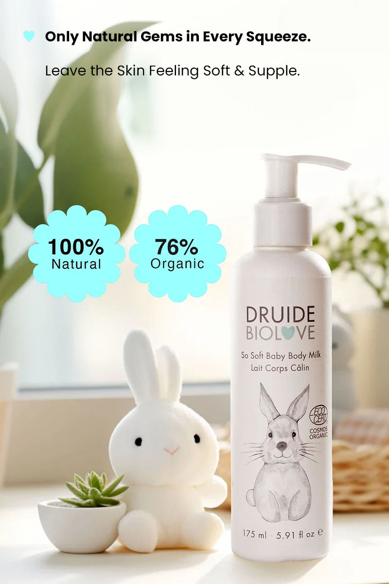 Druide Biolove organic baby moisturiser 
dispenser on a shelf with a teddy near and text displaying "100% natural, 76% organic, only natural gems in every squeeze, leave the skin feeling soft and supple".