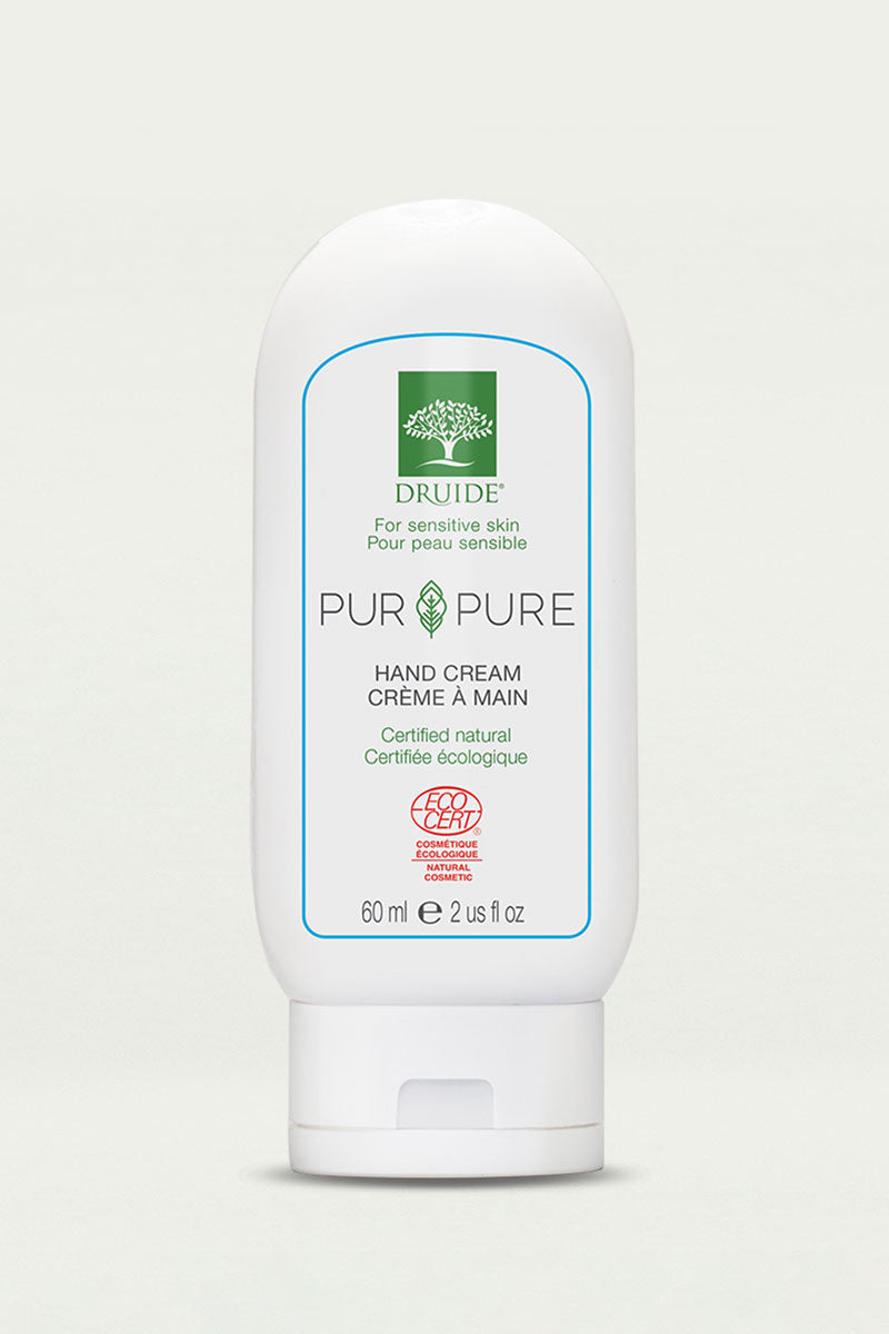 Druide Pur and Pure organic hand cream, 60 ml, 2 US fl. oz. compact dispenser with Ecocert certified natural icon, placed against a clear background.